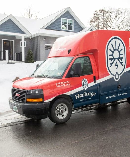 Heritage Home Service truck in front of home