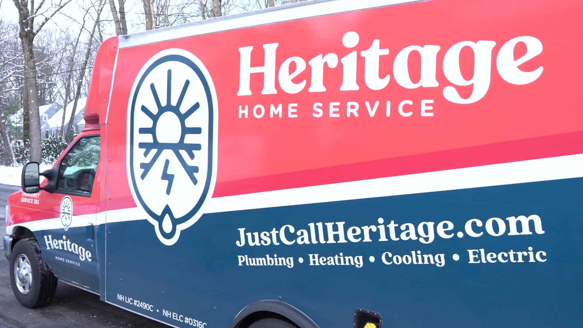 logo of heritage home service on side of truck