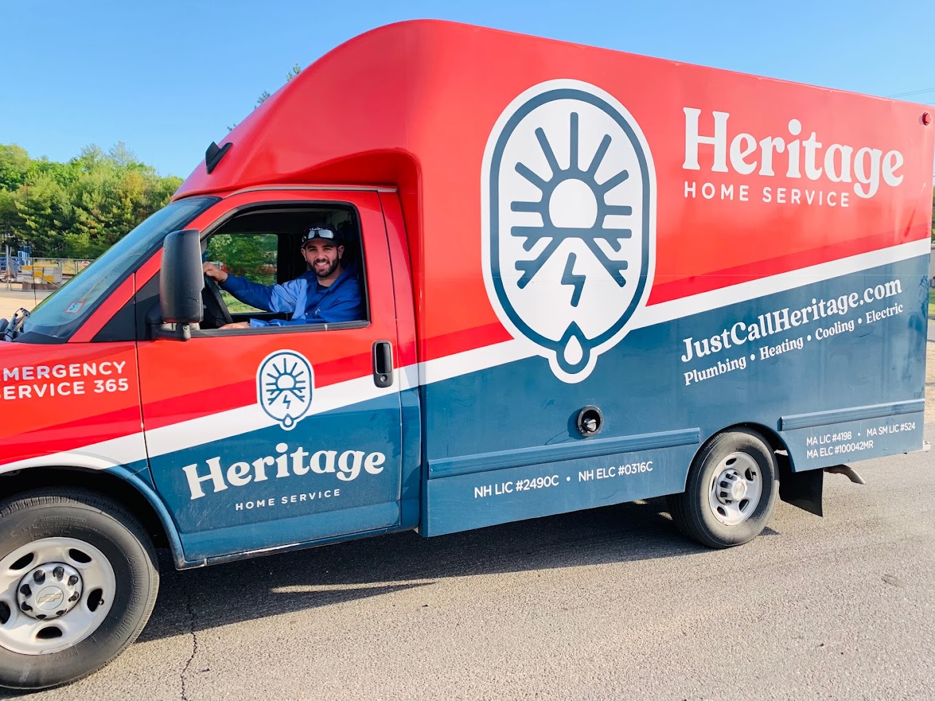 heritage home service employee driving service truck