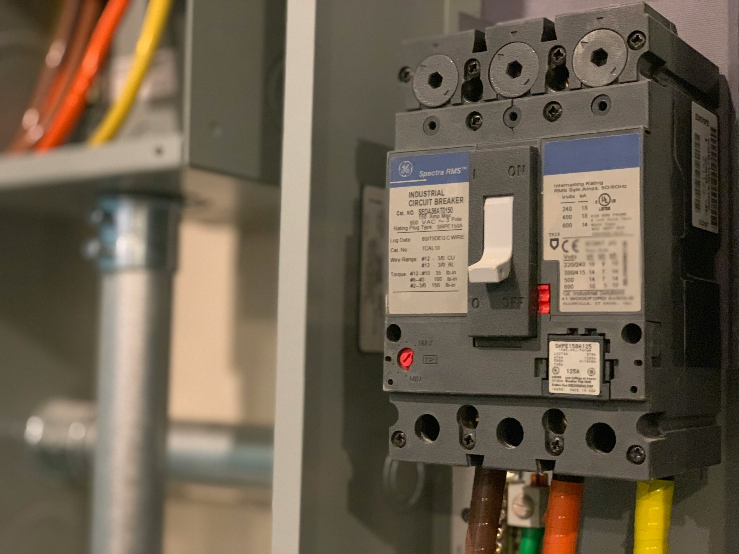 Electrical panel service with circuit breaker designed to protect against electrical surge and modern power demand